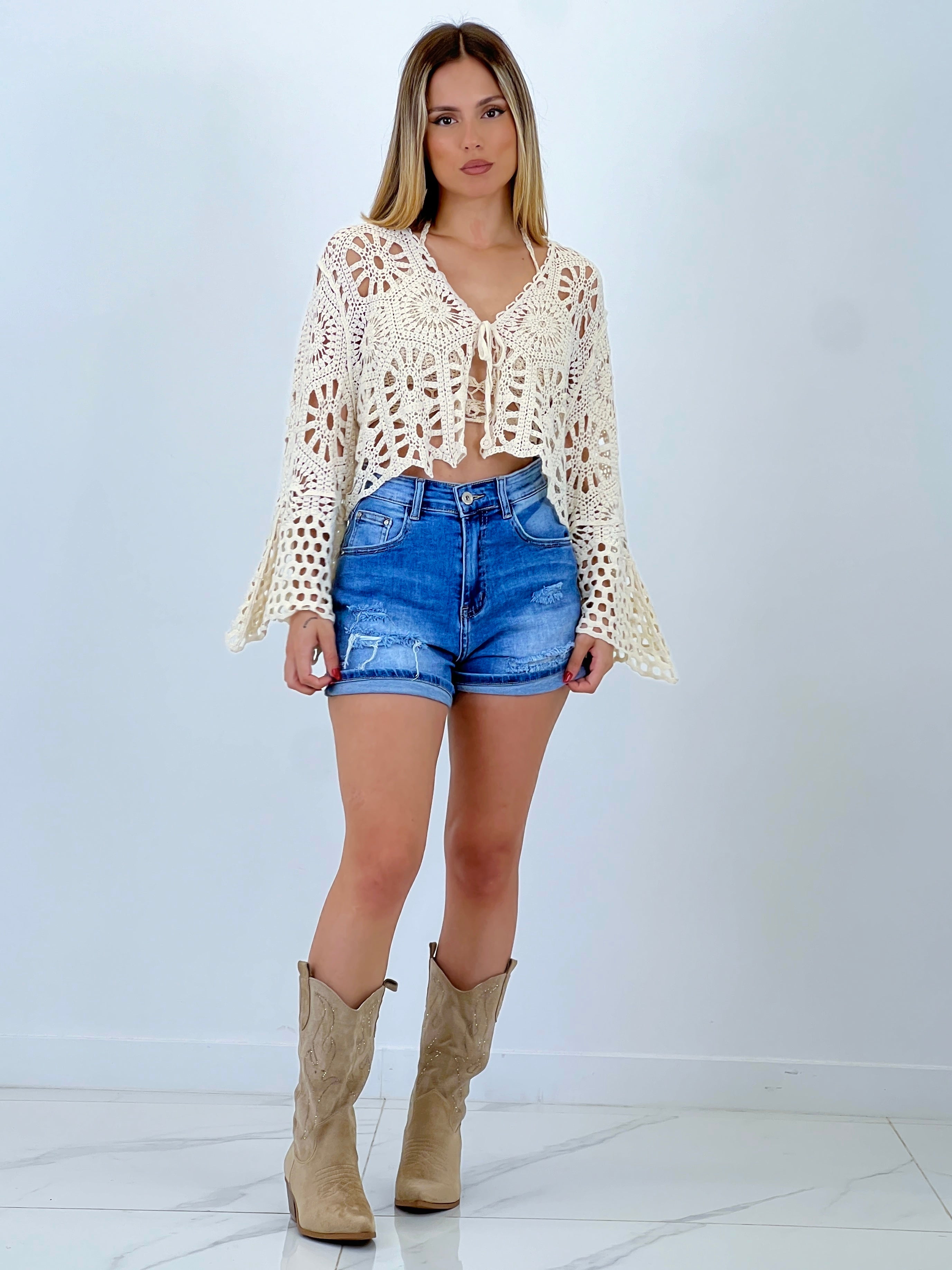 Distressed denim shorts