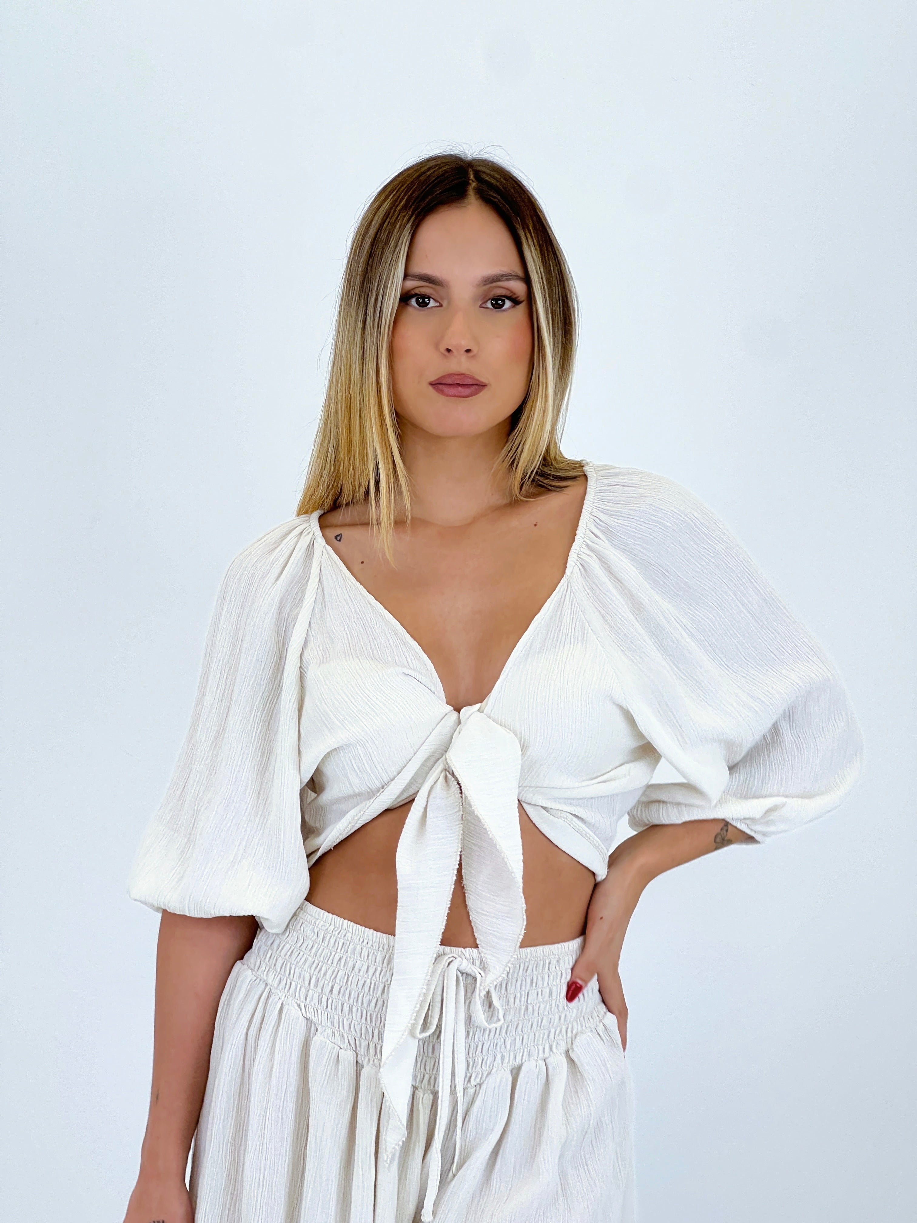 Blusa abierta nudo
