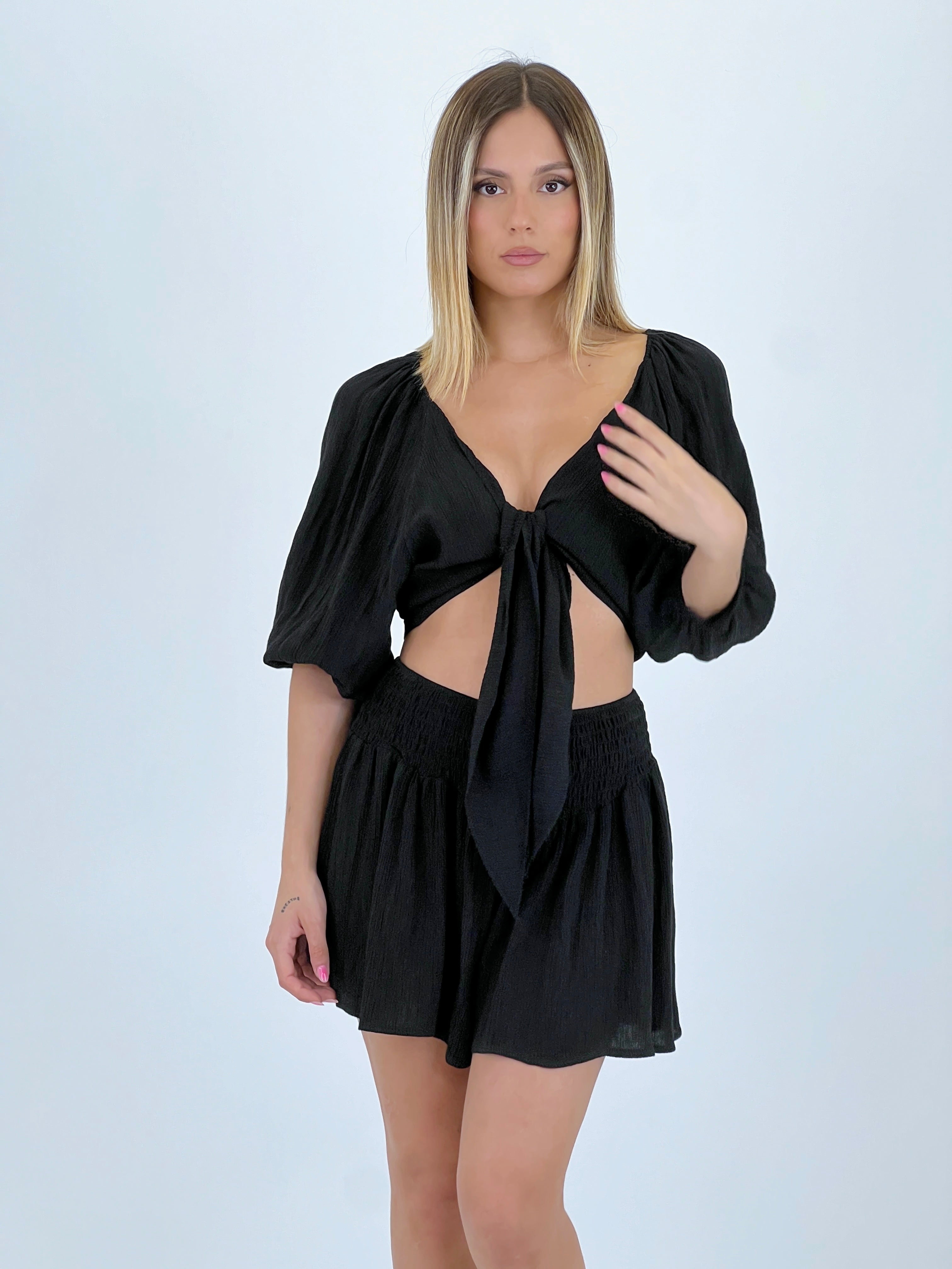 Blusa abierta nudo