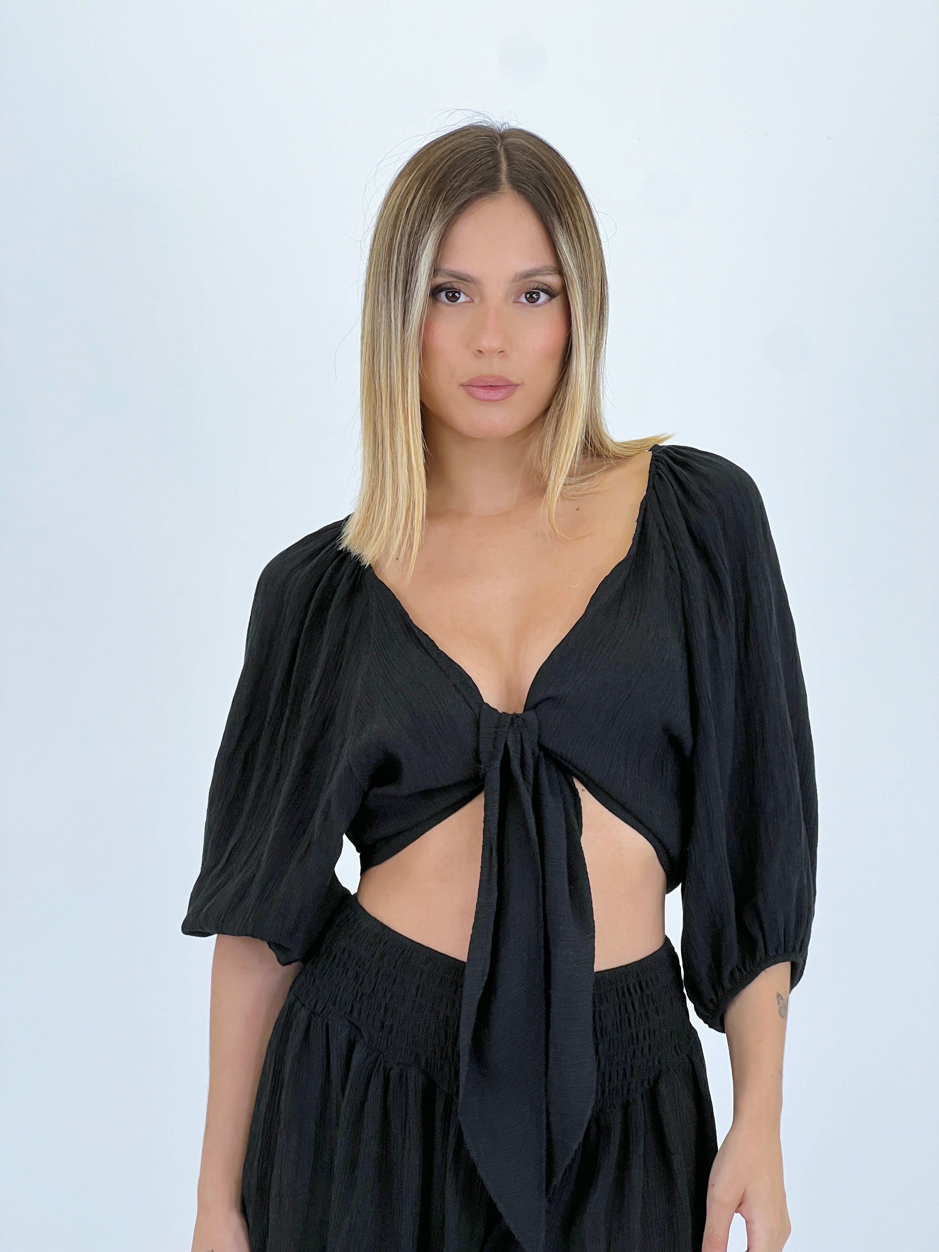 Blusa abierta nudo