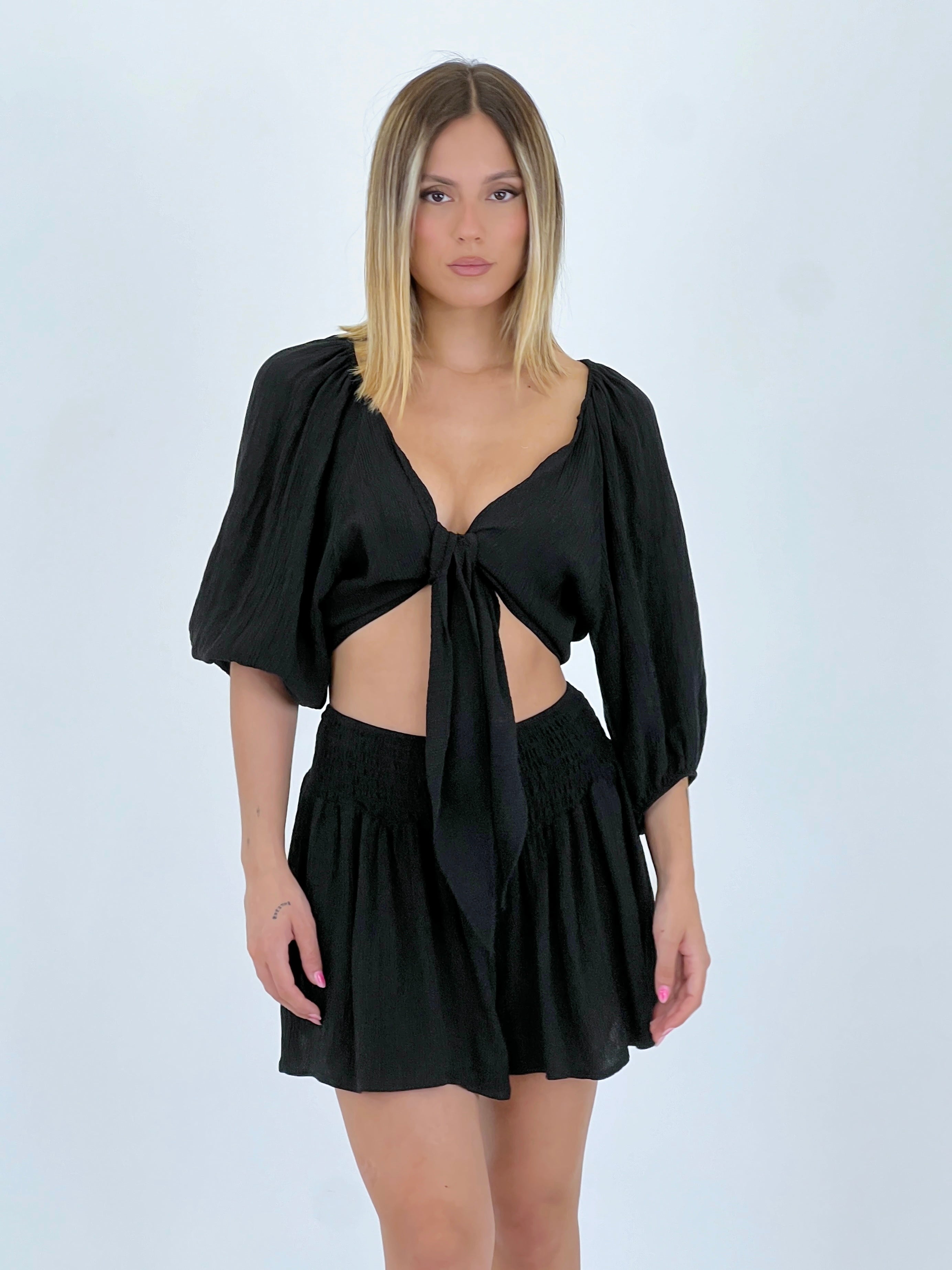 Blusa abierta nudo