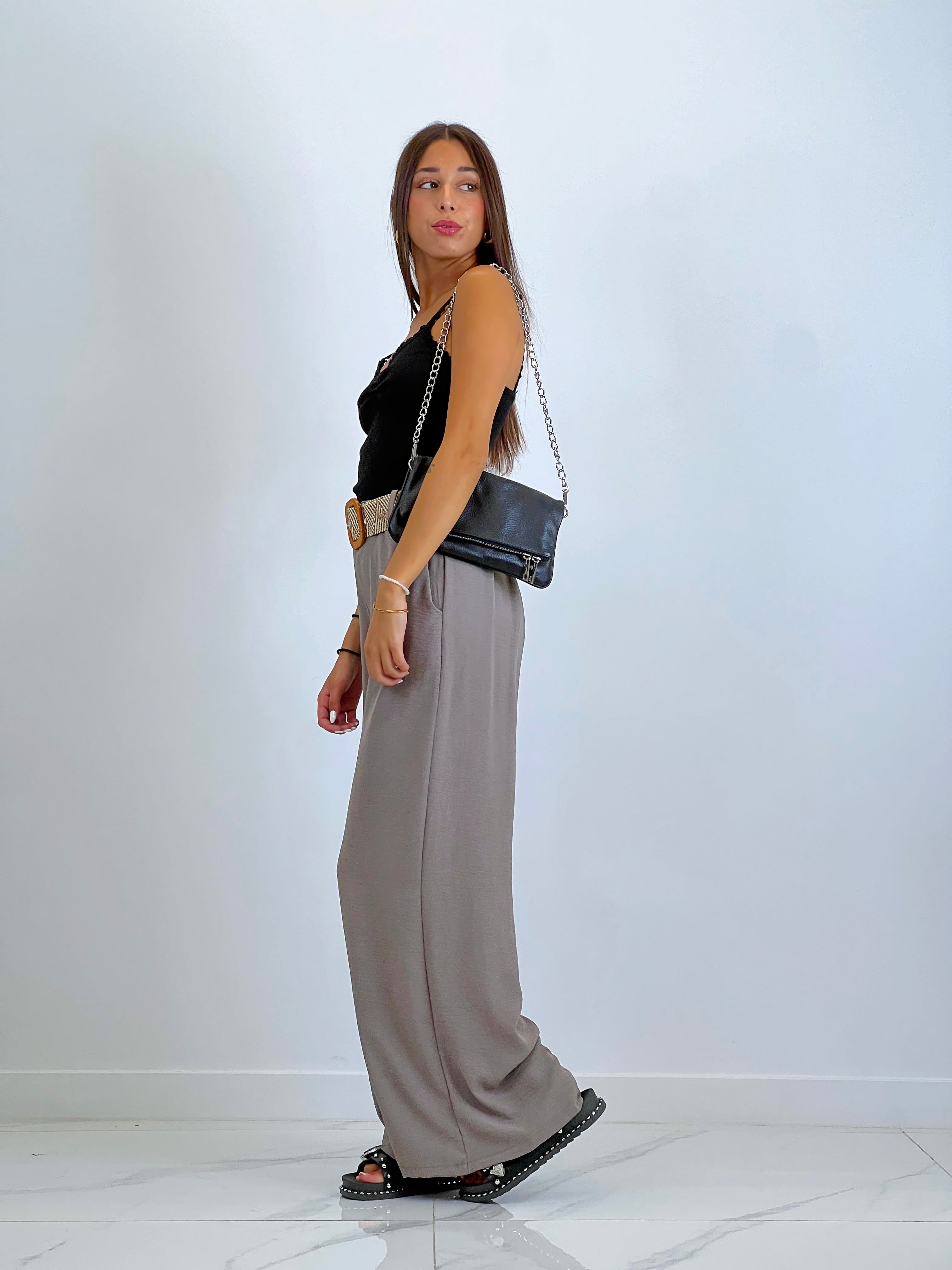 Flowing trousers with raffia belt
