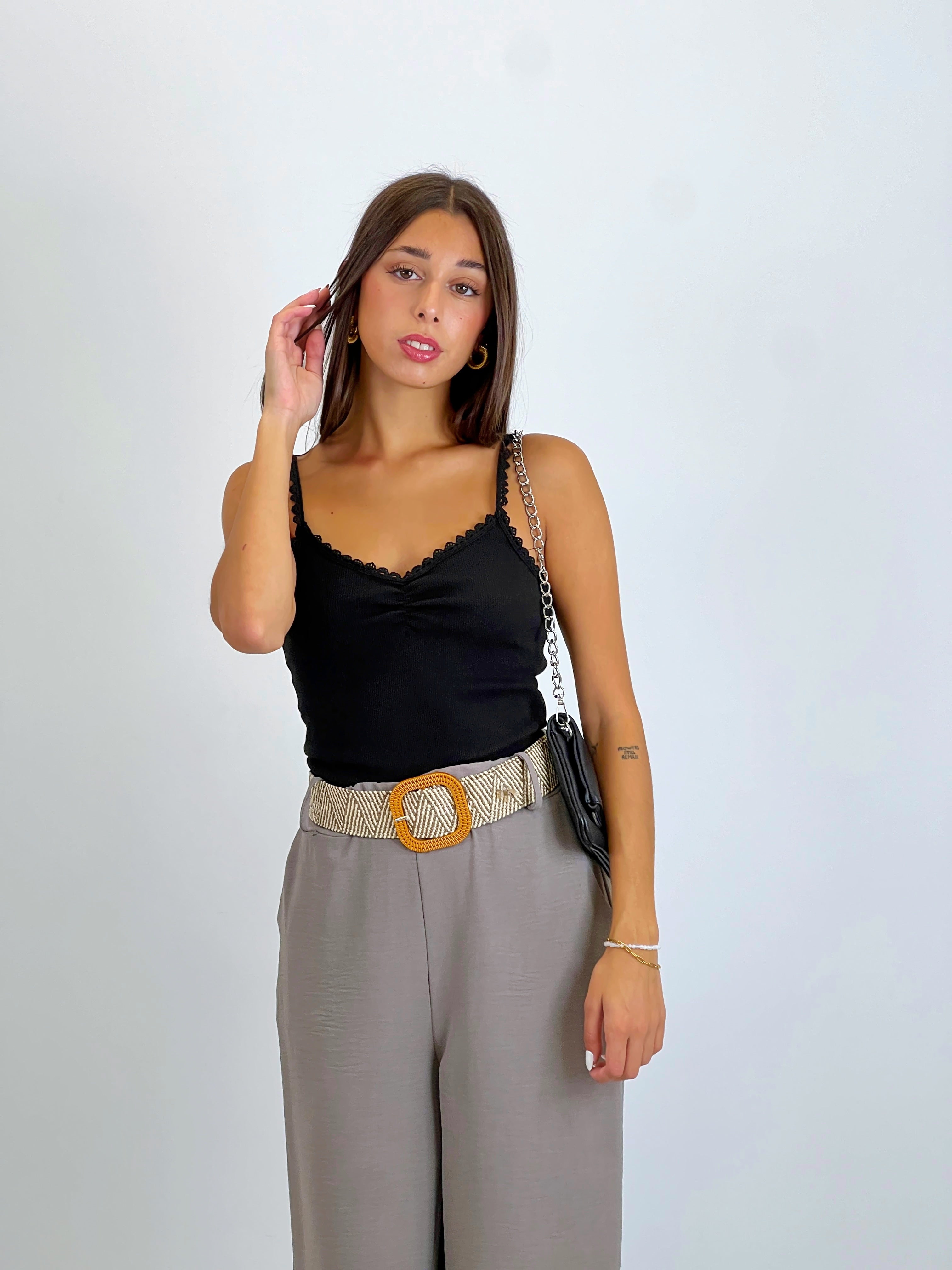Flowing trousers with raffia belt