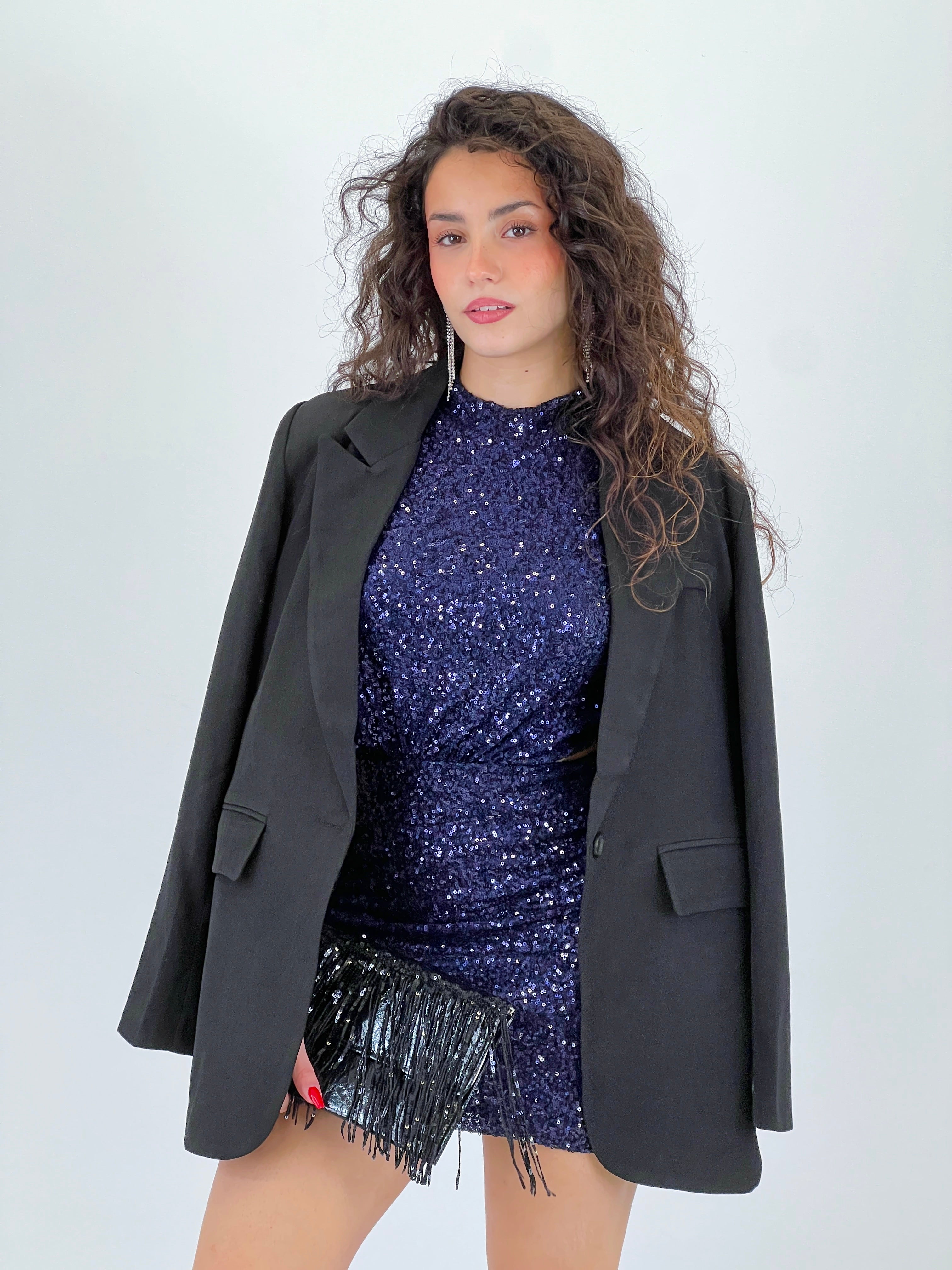 Bossa de mà amb tires de lluentons