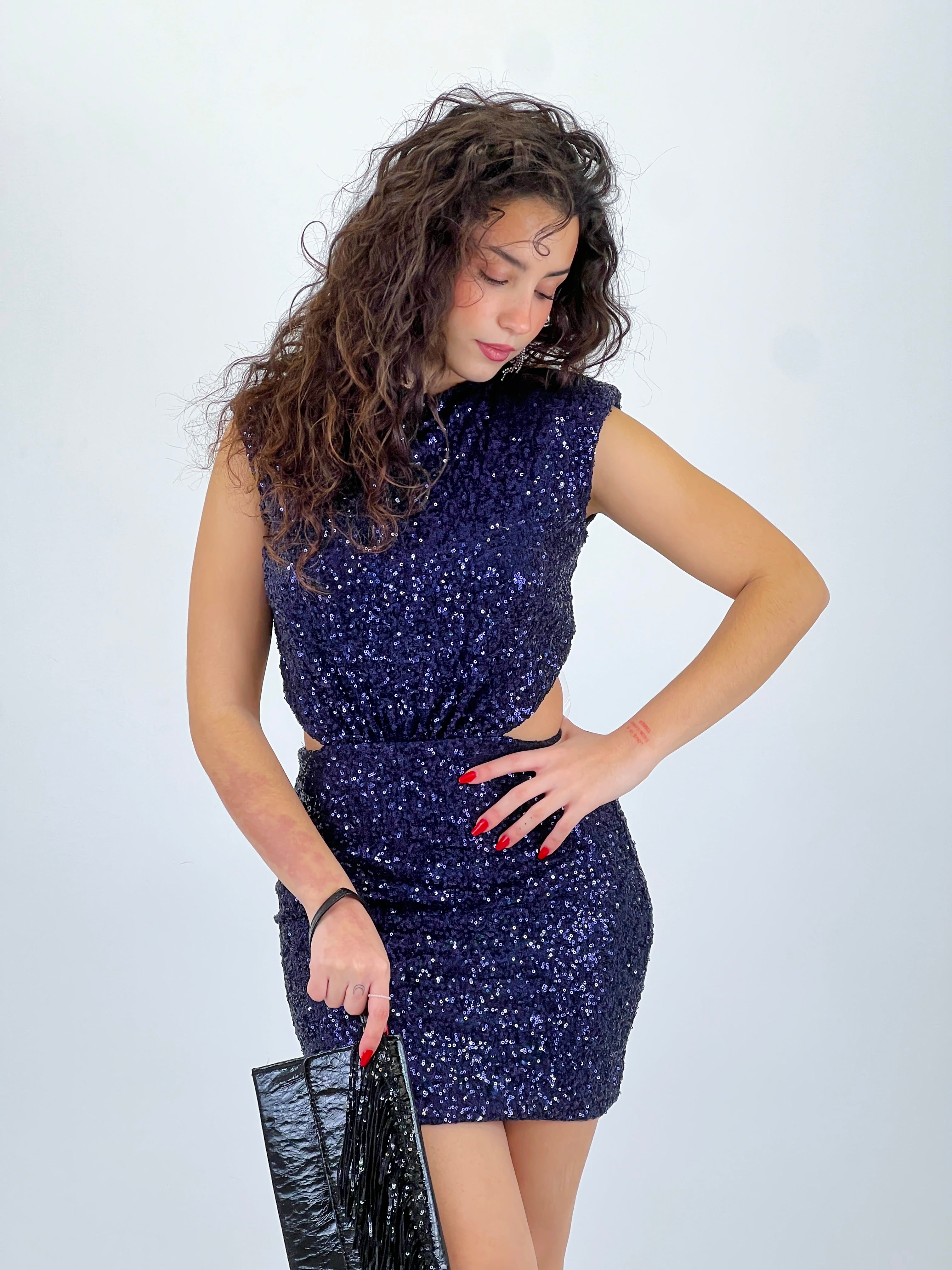 Bossa de mà amb tires de lluentons