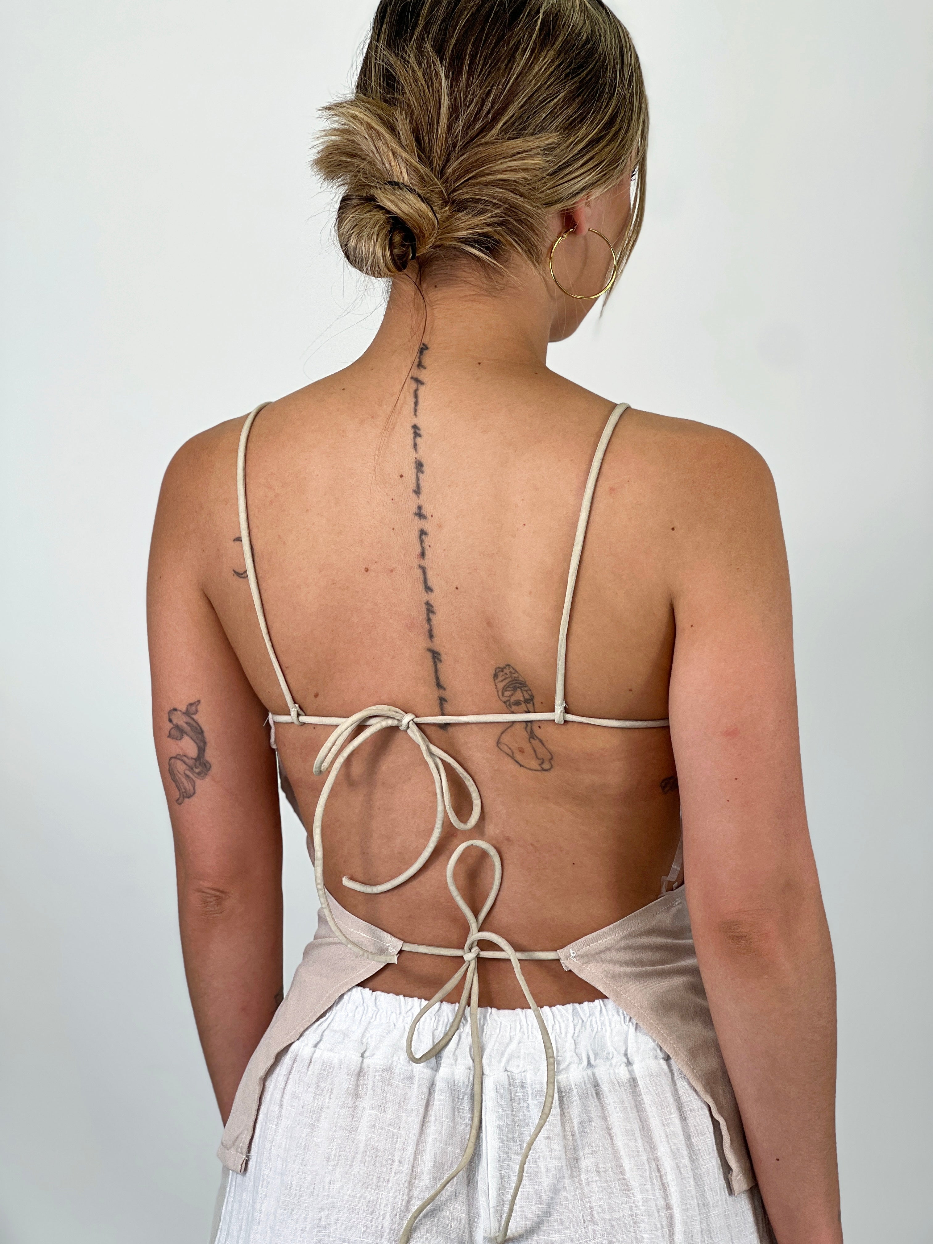 Top drapeado espalda descubierta