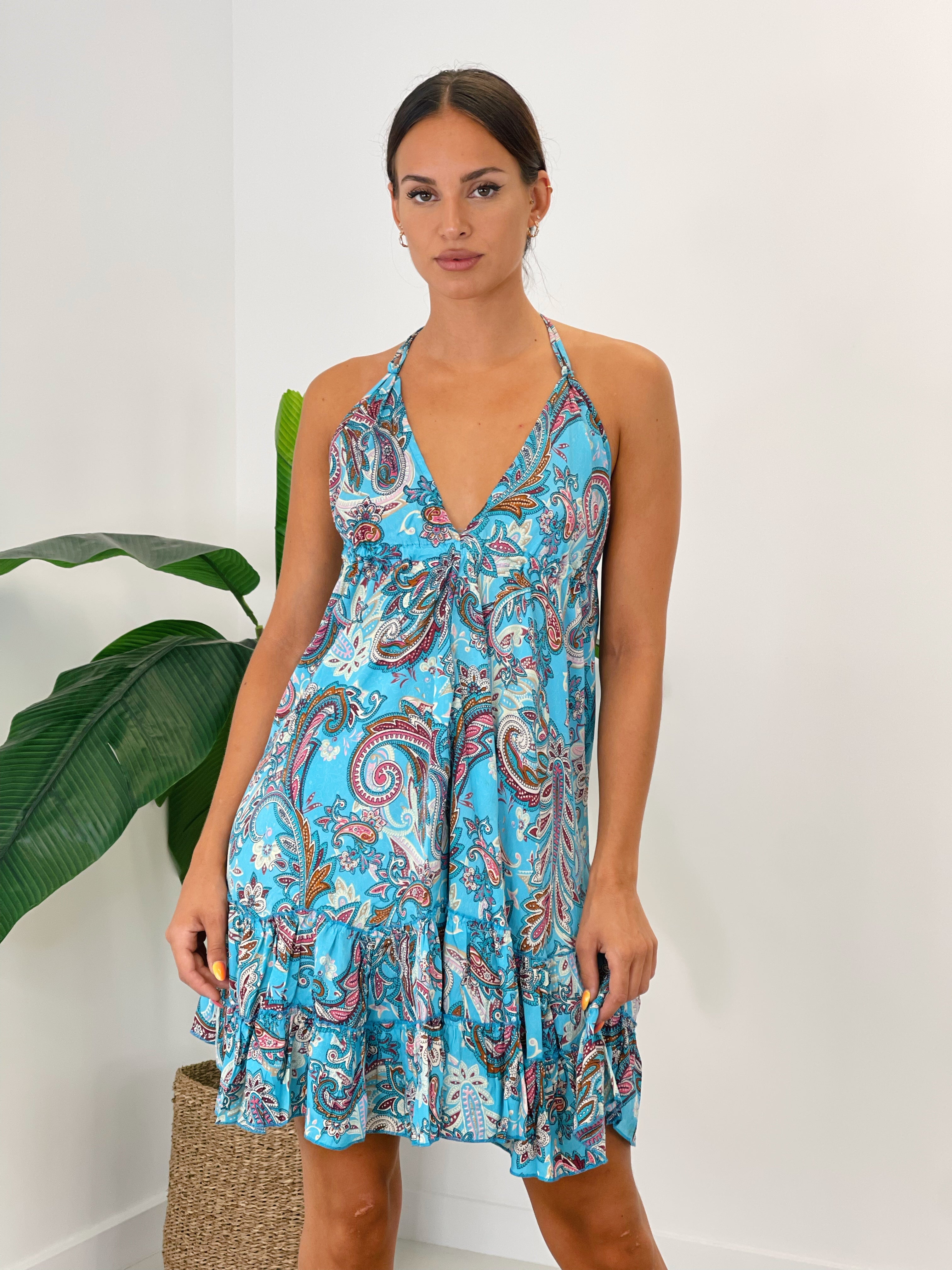 Vestido corto con volante y doble tirante fino anudado al cuello color turquesa | Zebra&Maduixa