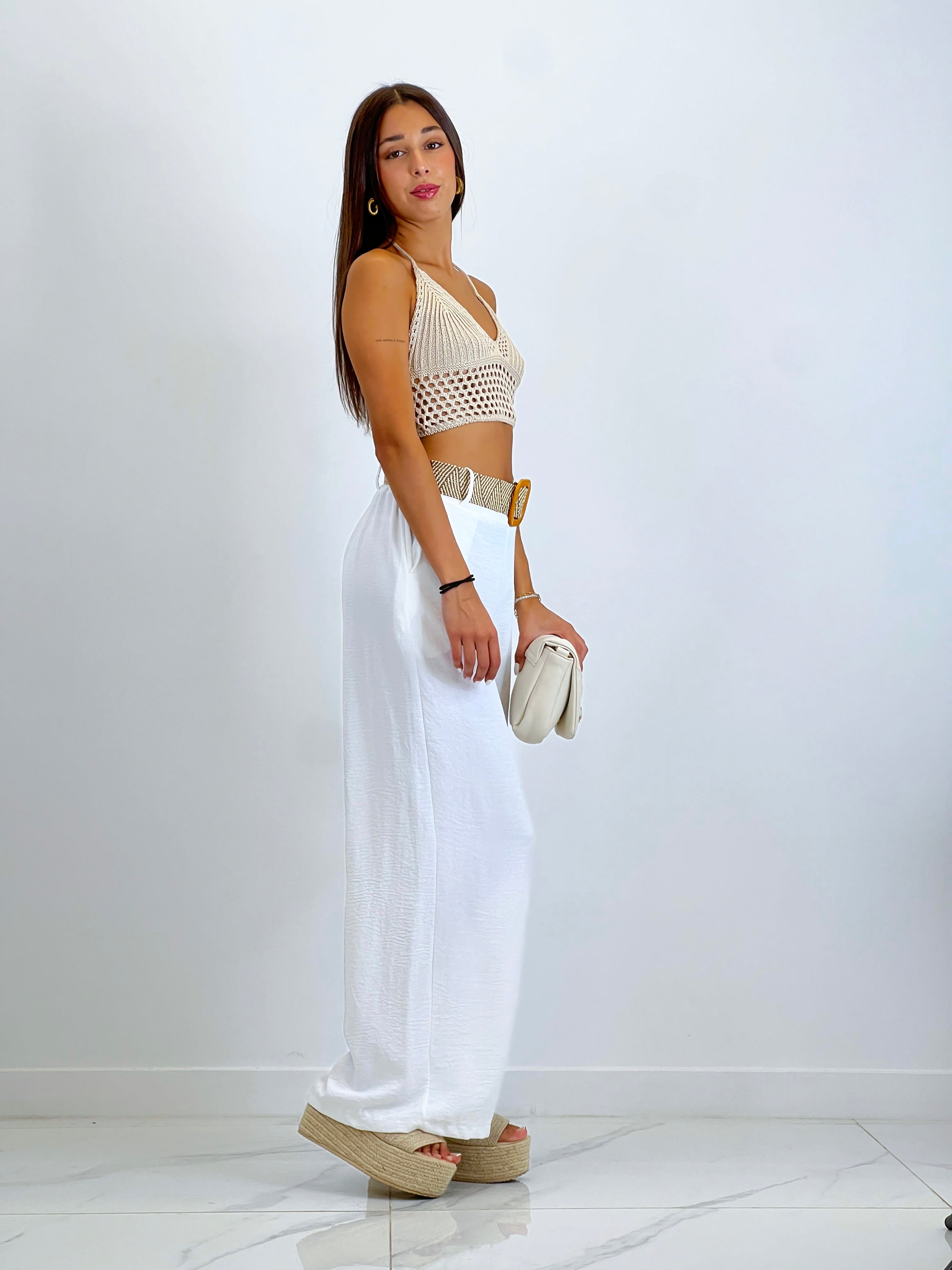 Flowing trousers with raffia belt