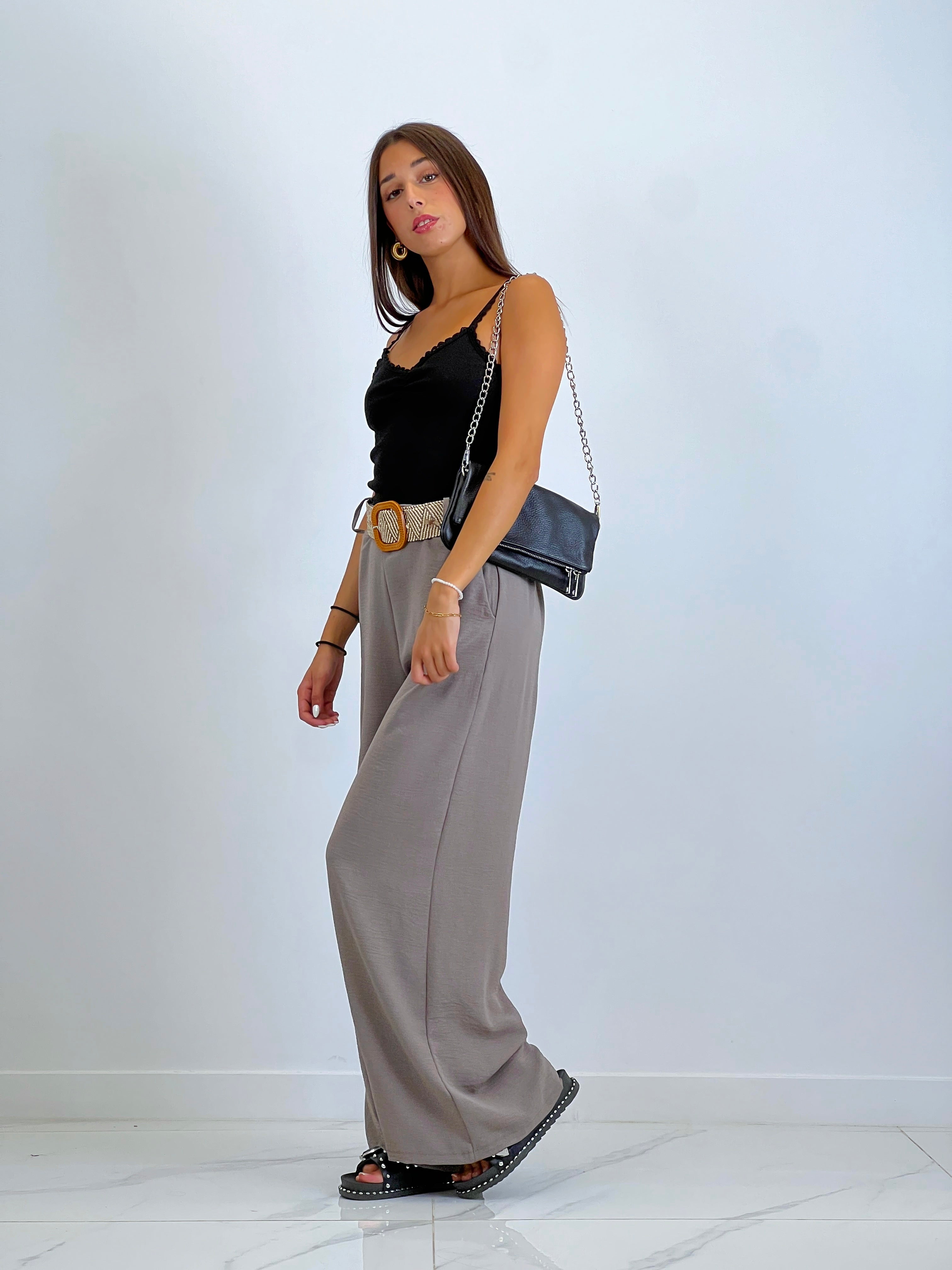 Flowing trousers with raffia belt
